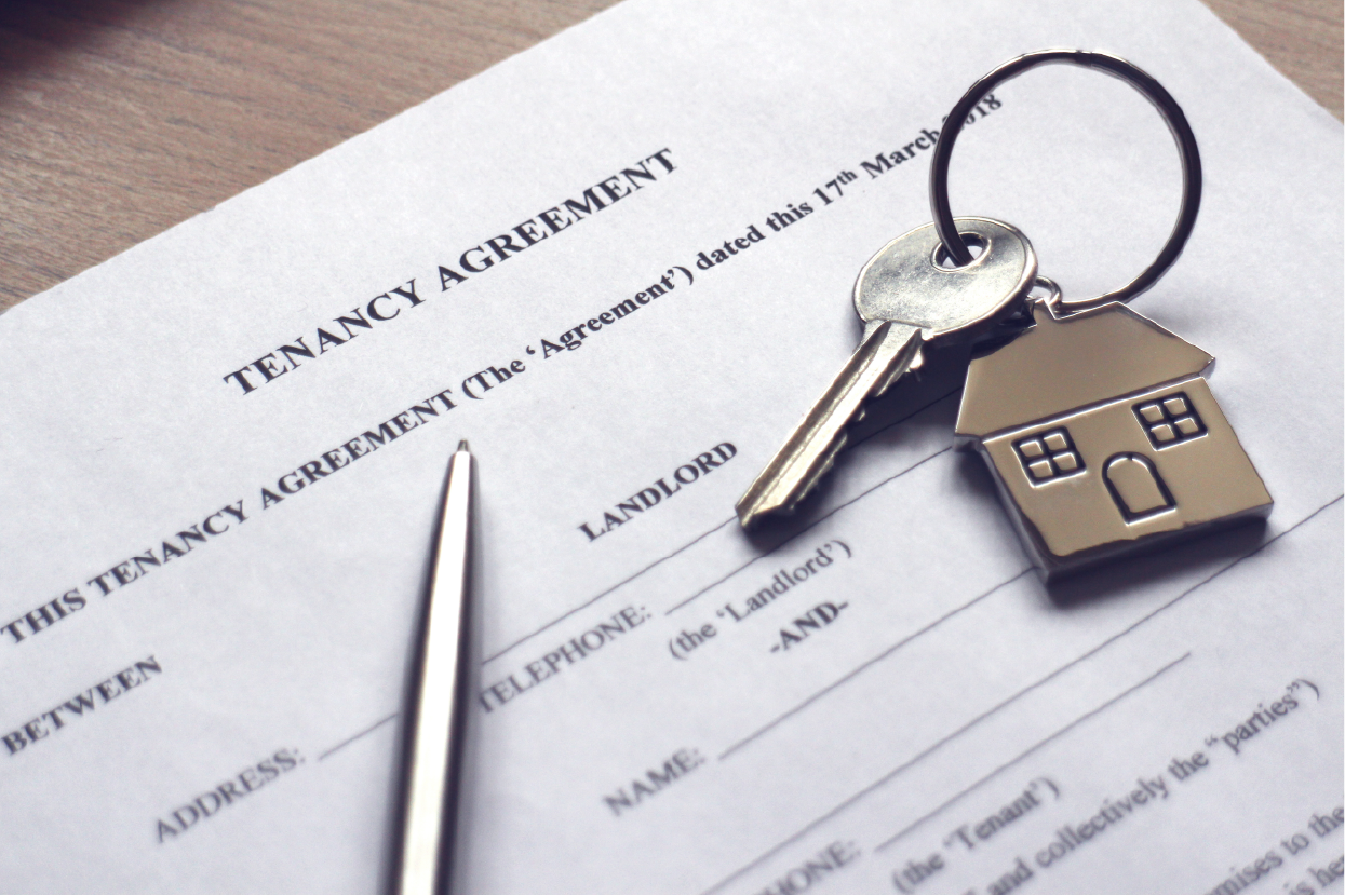 Tenancy document with house shaped keyring and pen 01