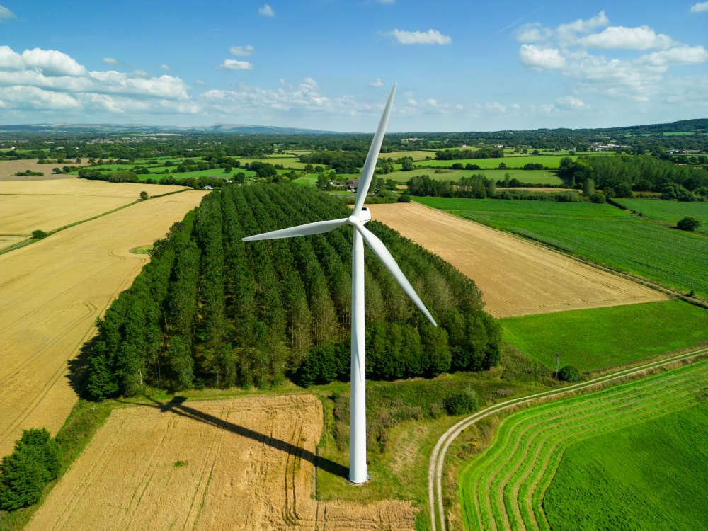 Wind Turbine Forefront Countryside in Background 01